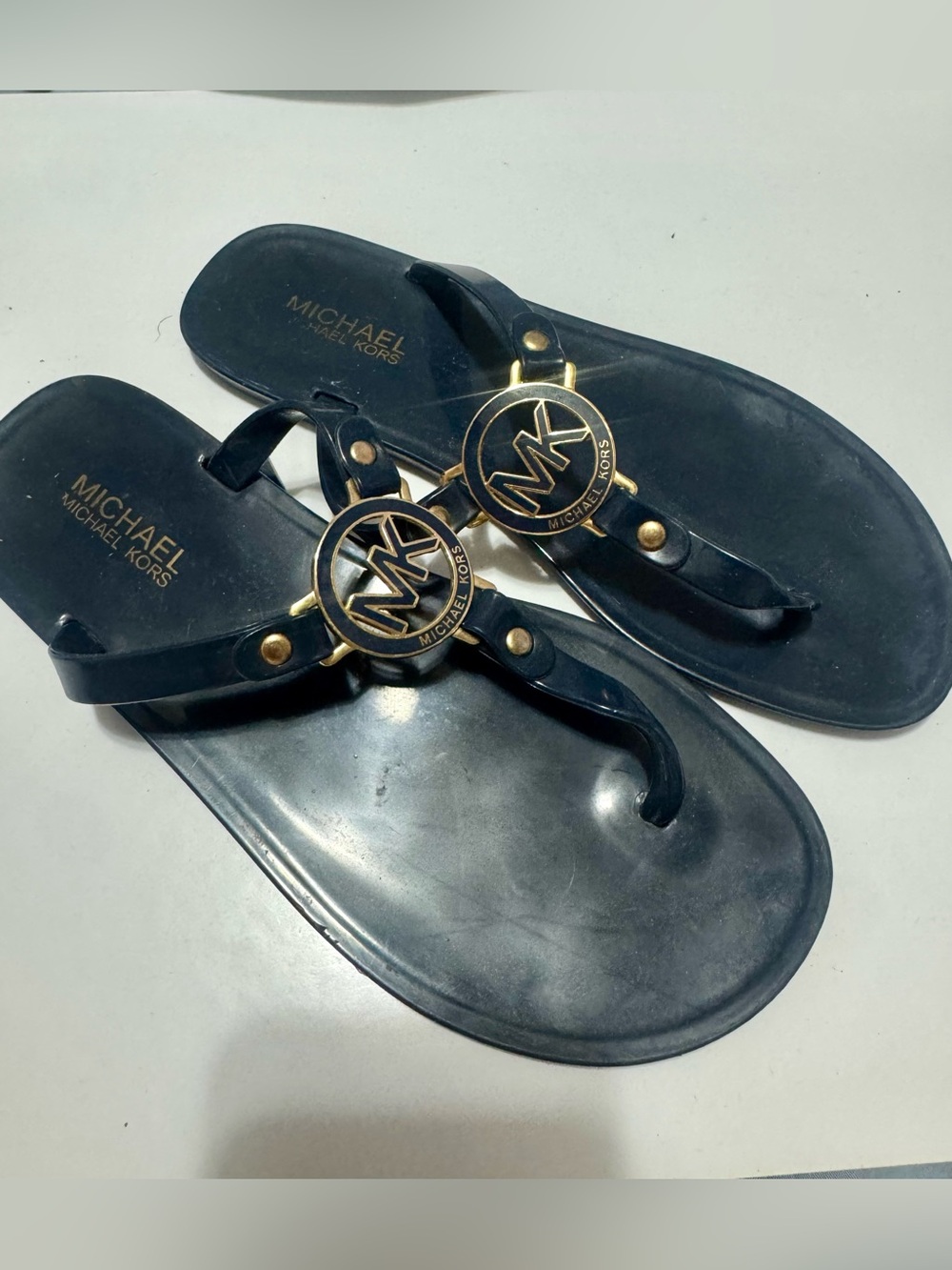 Michael Kors Navy Jelly Thong Sandals with Gold MK Medallions